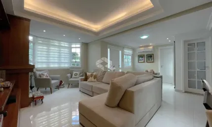 Casa em condomomínio, 1 suíte + 2 dormitóios, lareira no bairro guaruja