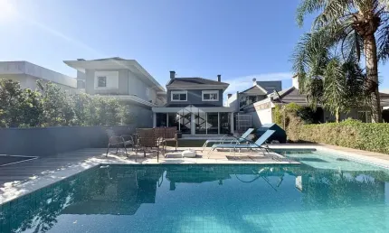 Casa em condomínio fechado com 3 quartos à venda na Avenida Juca Batista, 8000, Belém Novo, Porto Alegre