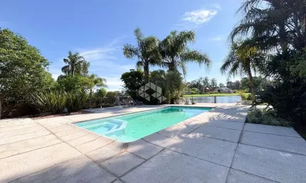 Casa em condomínio fechado com 3 quartos à venda na Avenida Juca Batista, 8000, Belém Novo, Porto Alegre