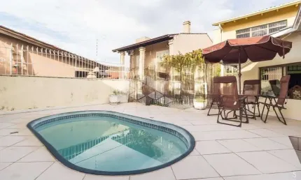 Cada de 3 dormitórios, suíte master, piscina a 100 metros Zaffari Cavalhada