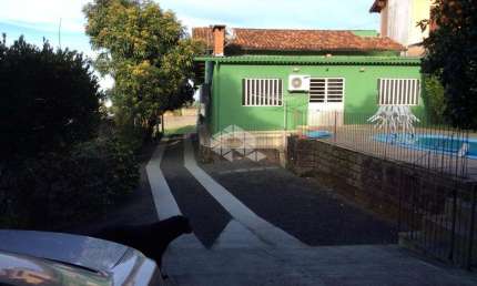 Casa, semimobiliada, na Vila Nova, por R$850.000,00.
