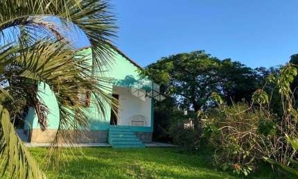 Casa com 3 Dormitórios  à Venda no bairro Vila Nova
