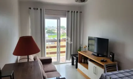 Excelente Apartamento amplo mobiliado de 1 dormitório com sacada aberta, sol norte e localização privilegiada no bairro Passo D'areia