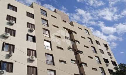AMPLO APARTAMENTO DE 2 DORMITÓRIOS COM SACADA, CHURRASQUEIRA E LAREIRA.