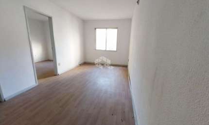 Apartamento térreo de 1 domitório com 42,16m ² e 1 vaga escriturada .