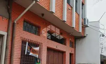 Prédio residencial e comercial de dois pisos com área de 410m² privativos e localizado próximo ao supermercado zaffari ipiranga.