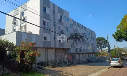 Apartamento à venda de 2 dormitórios, living amplo, cozinha americana