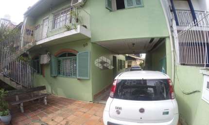 Casa com 4 quartos à venda na Avenida Montenegro, 215, Petrópolis, Porto Alegre