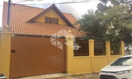 Casa com 2 quartos à venda na Rua Afonso Rodrigues, 263, Jardim Botânico, Porto Alegre