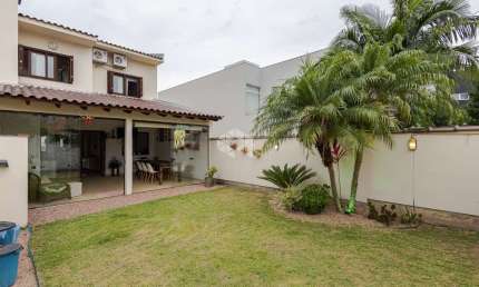 Casa em condomínio 3 dormitórios, 1 suíte, 3 vagas, Jardim Planalto, Porto Alegre.
