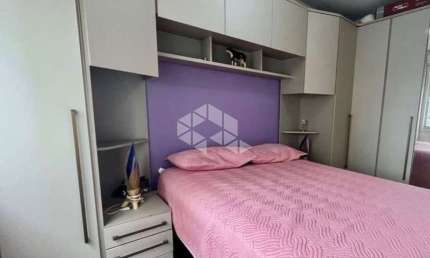 Apartamento semi mobiliado 2 dormitorio e vaga escriturada a venda no bairro Partenon.