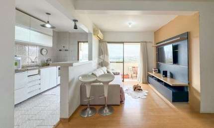 Apartamento de 3 quartos 1 suite, sacada com churrasqueira e vaga de garagem coberta no bairro Nonoai.