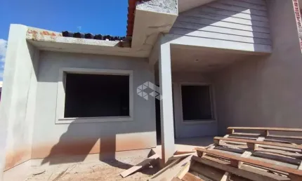Casa geminada 02 dormitórios, com pátio, em Santa Cruz do Sul