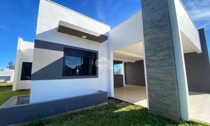 AMPLA CASA NO LOTEAMENTO NOVA SANTA CRUZ II COMPOSTA POR 3 DORMITÓRIOS SENDO 1 SUÍTE