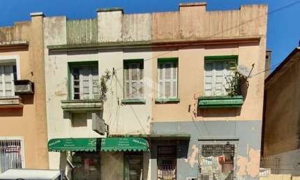 Casa com 4 quartos à venda na Rua Venâncio Aires, 1045, Centro, Santa Maria, 84 m2 por R$ 600.000