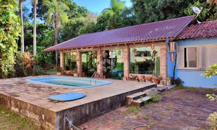 Casa com 292 m² e 4 quartos à venda no bairro Tristeza