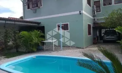 Casa com 4 quartos à venda na Rua Doutor Telmo Vergara, 556, Partenon, Porto Alegre