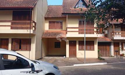 Casa em condomínio fechado com 3 quartos à venda na Avenida Orleaes, 105, Guarujá, Porto Alegre