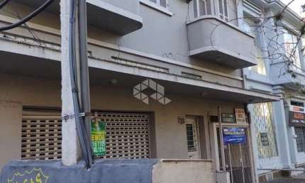 Terreno a venda, com construção residencial antiga, bairro Navegantes