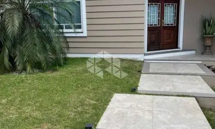 Casa em condomínio fechado com 3 quartos à venda na Avenida Senador Salgado Filho, 8500, Jardim Krahe, Viamão, 260 m2 por R$ 1.490.000