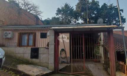 Casa com 3 quartos à venda na Rua Goiás, 15, Lomba do Pinheiro, Porto Alegre