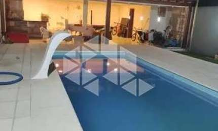 Casa com piscina e 03 dormitórios sendo 01 suíte no Bairro Maria Regina em Alvorada.
