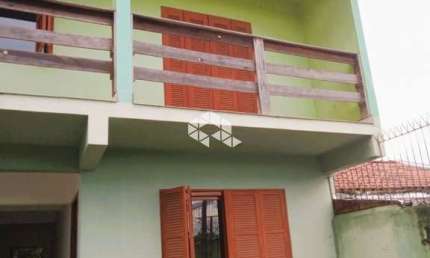 Casa sobrado com 02 suítes no Jardim Algarve Alvorada.