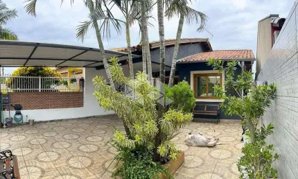 Casa com 4 quartos à venda na Avenida Elmira Pereira Silveira, 1270, Jardim Algarve, Alvorada
