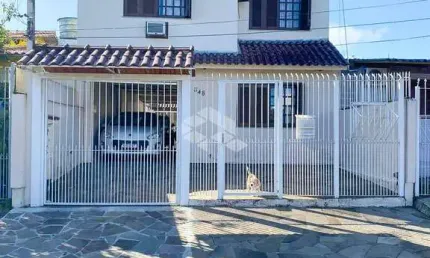Casa com 03 dormitórios no bairro jardim Algarve em Alvorada.