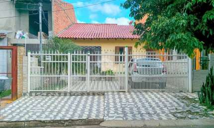 Casa de 02 dormitórios no Jardim Algarve em Alvorada.