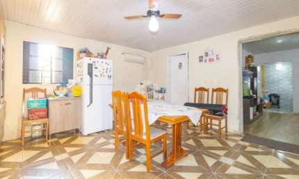 Casa de 3 Dormitórios em Alvorada no Bairro Santa Bárbara .
