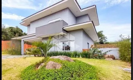 Casa com 3 quartos à venda na Estrada das Três Meninas, 222, Vila Nova, Porto Alegre
