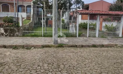 Casa com 4 quartos à venda na Rua Jacundá, 164, Guarujá, Porto Alegre