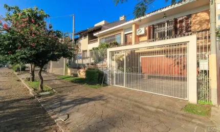 Casa com 3 quartos à venda na Rua Peri Melo, 188, Nonoai, Porto Alegre