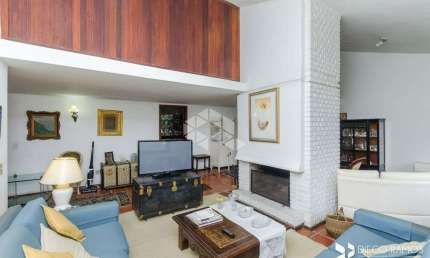 Casa 4 dorms à venda Rua Edgar Luiz Schneider, Jardim Isabel - Porto Alegre