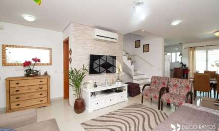 Casa 3 dorms à venda Rua Izar Faria Correa Sant'anna, Hípica - Porto Alegre