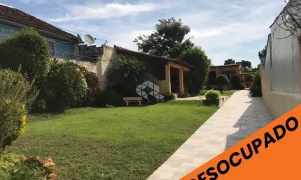 Casa com 2 quartos à venda na Rua Atílio Supertti, 137, Vila Nova, Porto Alegre