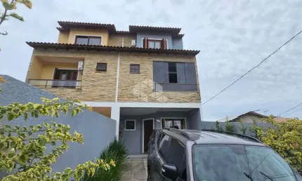 Casa com 3 quartos à venda na Rua dos Carijós, 324, Espírito Santo, Porto Alegre