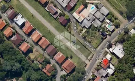 Terreno a venda em condomínio fechado no bairro vila nova em porto alegre.