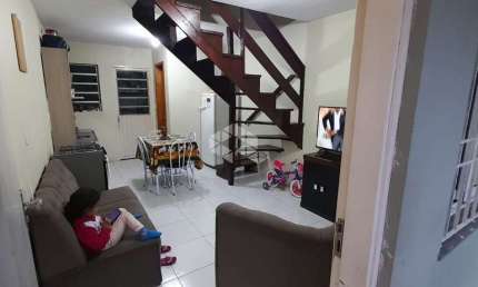 Sobrado de 2 quartos uma vaga de garagem com entrada coletiva de 71m , churrasqueira coletiva no pátio no bairro Cidade Nova