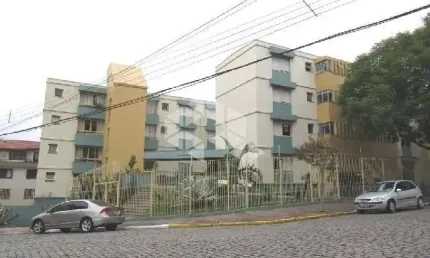 Vendo: apartamento amplo com  dois quartos, e um box  de garagem no pio x.