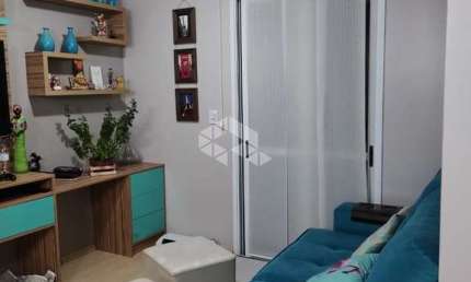 Apartamento com 55m semi mobiliado com 2 dormitórios uma vaga de garagem coberta no bairro Desvio Rizzo