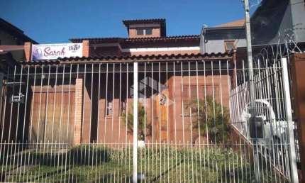 Casa 03 dormitórios e 03 vagas com 215m²  no bairro Vila Nova em Poa.