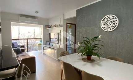 Apartamento à venda no Partenon com 2 quartos e 1 vaga - 64m² reformado e mobiliado