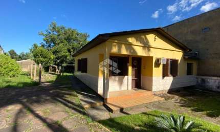 Casa com 3 quartos à venda na Rua Ouro Preto, 764, Jardim Floresta, Porto Alegre
