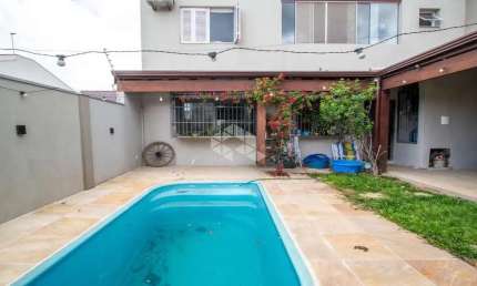 Casa com 5 quartos e 326m² à venda em Alto Petrópolis, Porto Alegre.