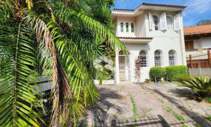 Casa 3 dormitórios com piscina - Ipanema / Jardim Isabel em Porto Alegre