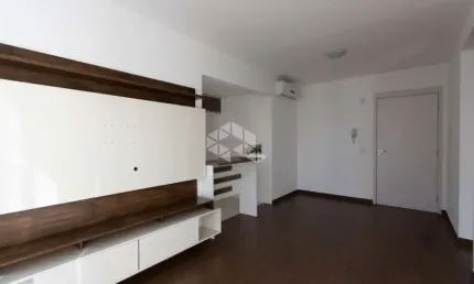 Apartamento semimobiliado, de dois dormitórios,  na Vila Nova.