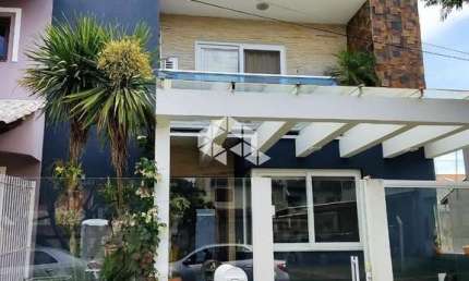 Casa com 3 quartos à venda na Rua Guatambu, 271, Hípica, Porto Alegre