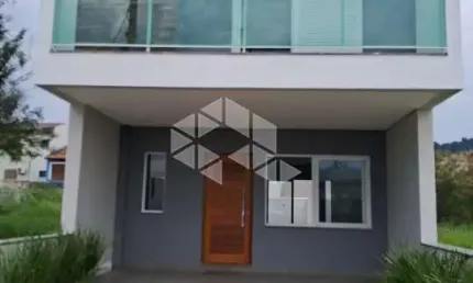 Casa 3 dormitórios sendo 1 suite com sacada 2 vagas de garagem atrás do Zaffari da Hípica -